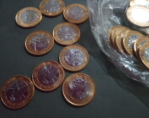 Moedas da . olimpíada,e do beija flor